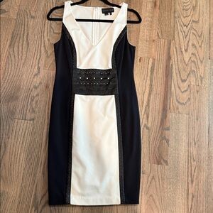 Never worn Sachin and Bibi dress that is has an incredibly flattering fit.